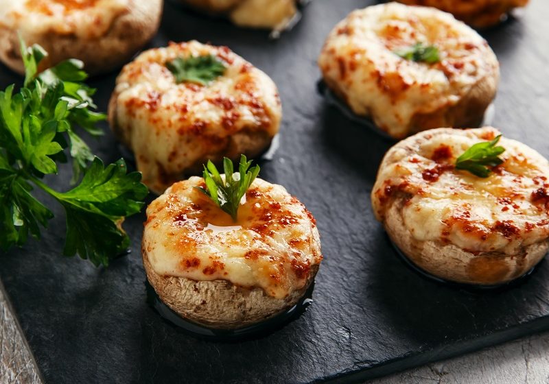 Baked mushrooms stuffed with three cheese